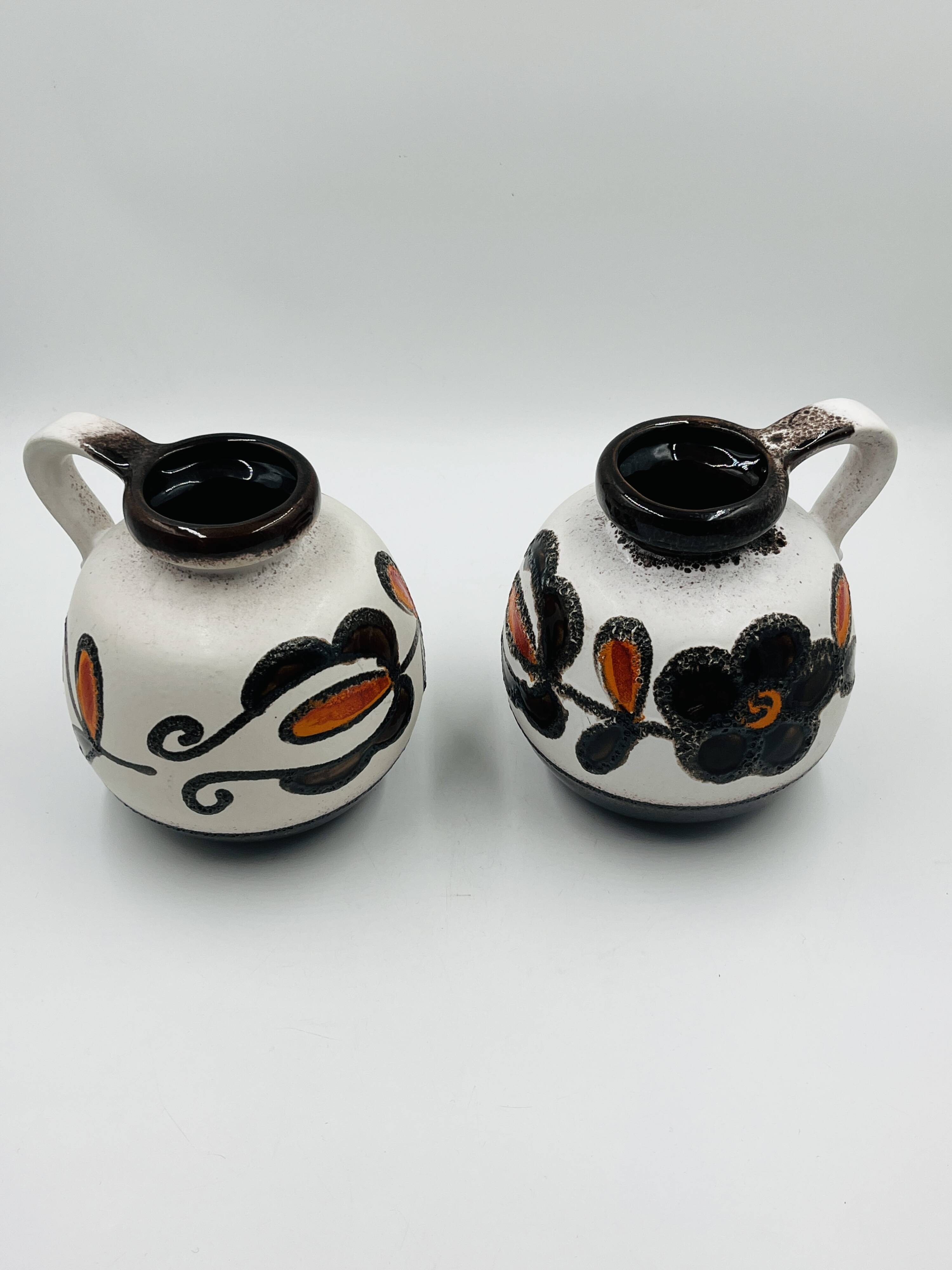 Pair of Scheurich 484 27 vases with floral decoration, West Germany.
