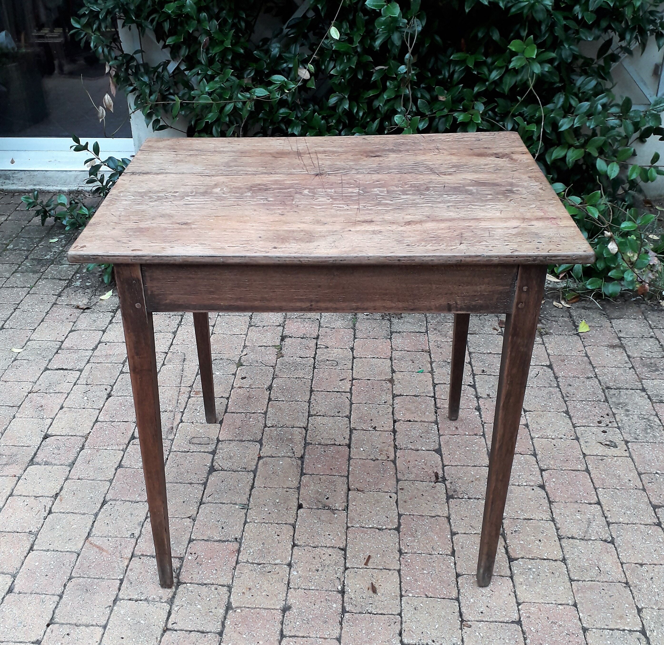 Old end table in oak