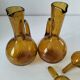 Duo of blown glass carafes – Biot signed – Bubbled amber glass