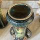 Pair of Art Nouveau slipware vases, hand-painted decoration.