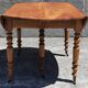 Extendable round table (with extensions and flaps), cherry wood.
