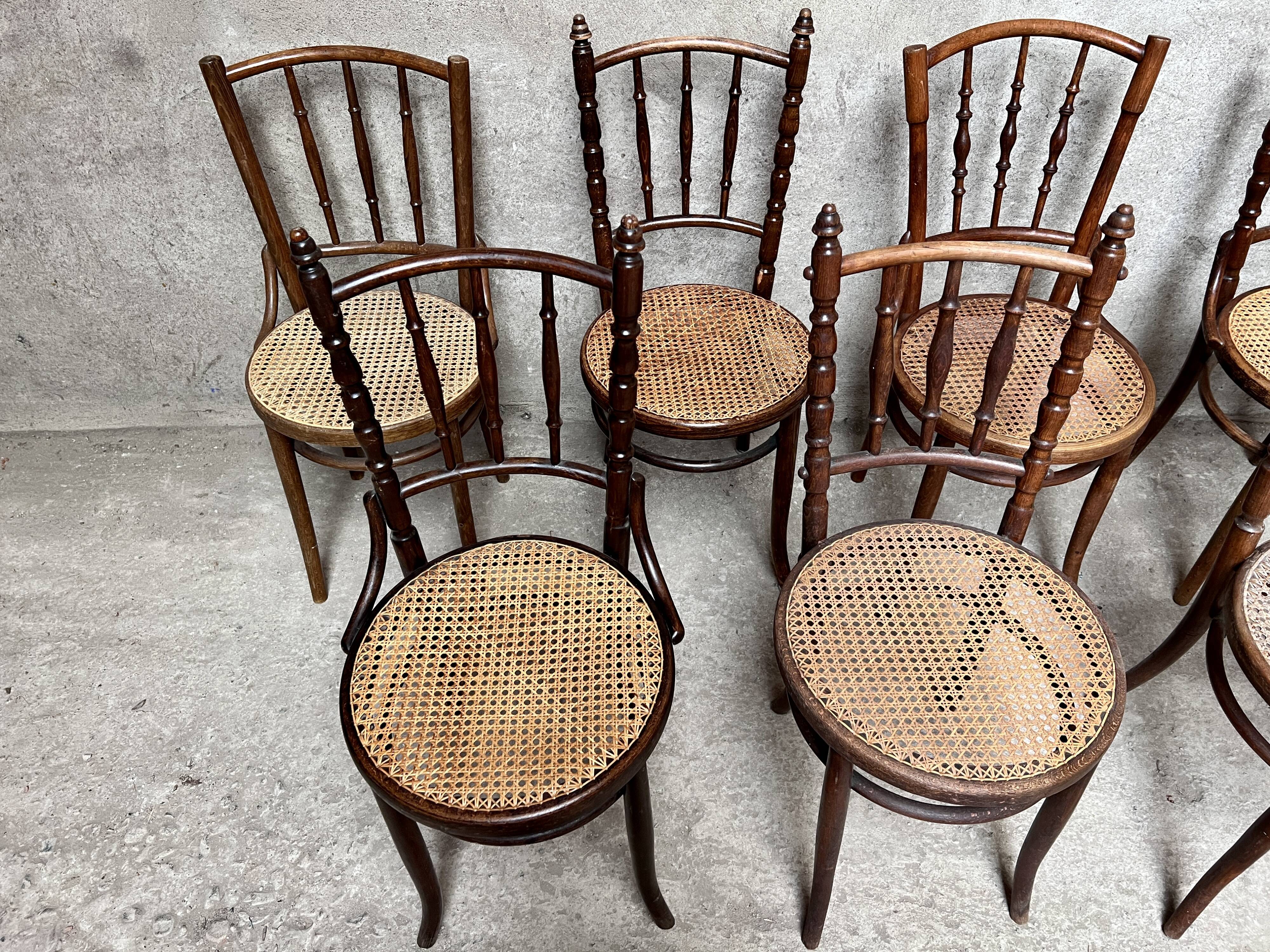 Series of 7 old bar cane cane bistro chairs