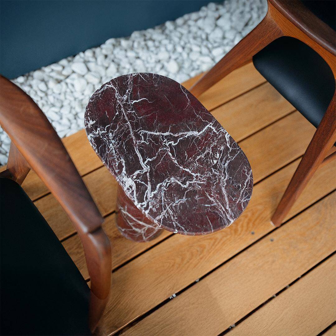 "Bold" side table in Rosso Levanto marble