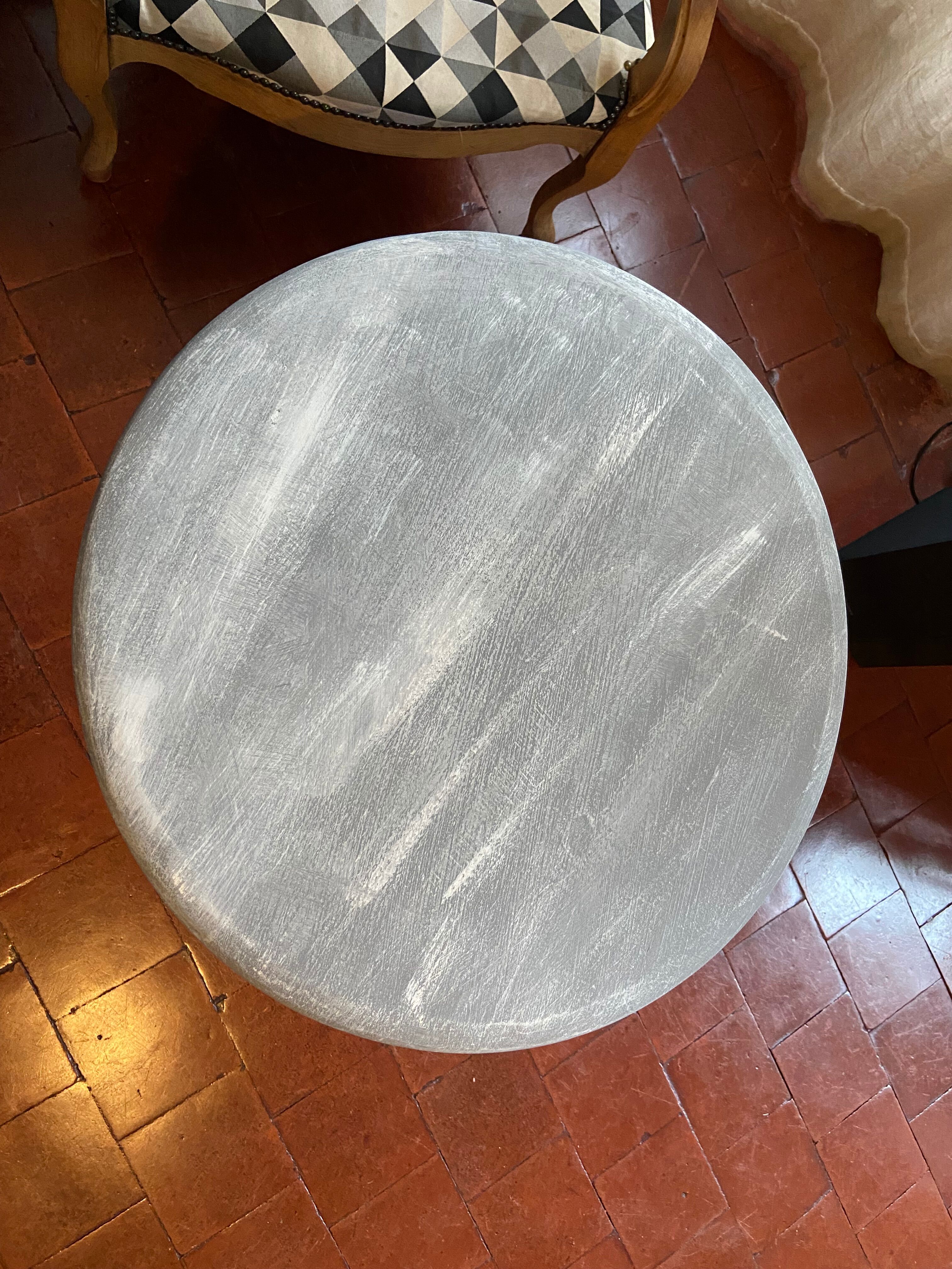 Patinated wooden pedestal table