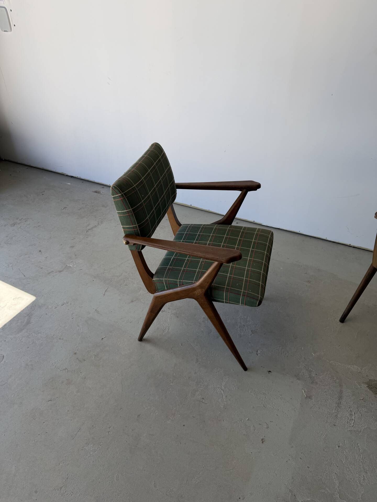 Pair of armchairs with a Scandinavian design in vintage teak from the 1960s.