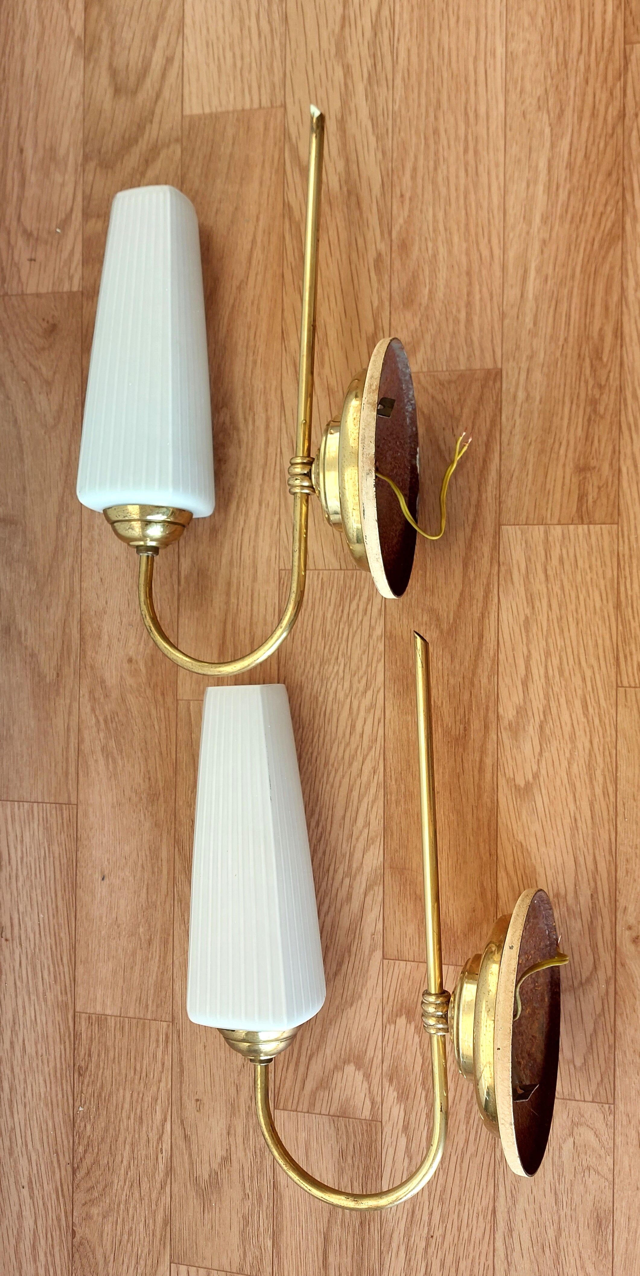 Pair of sconces with a light arm, brass and white opaline 1960.
