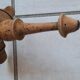Old accordion wall coat rack