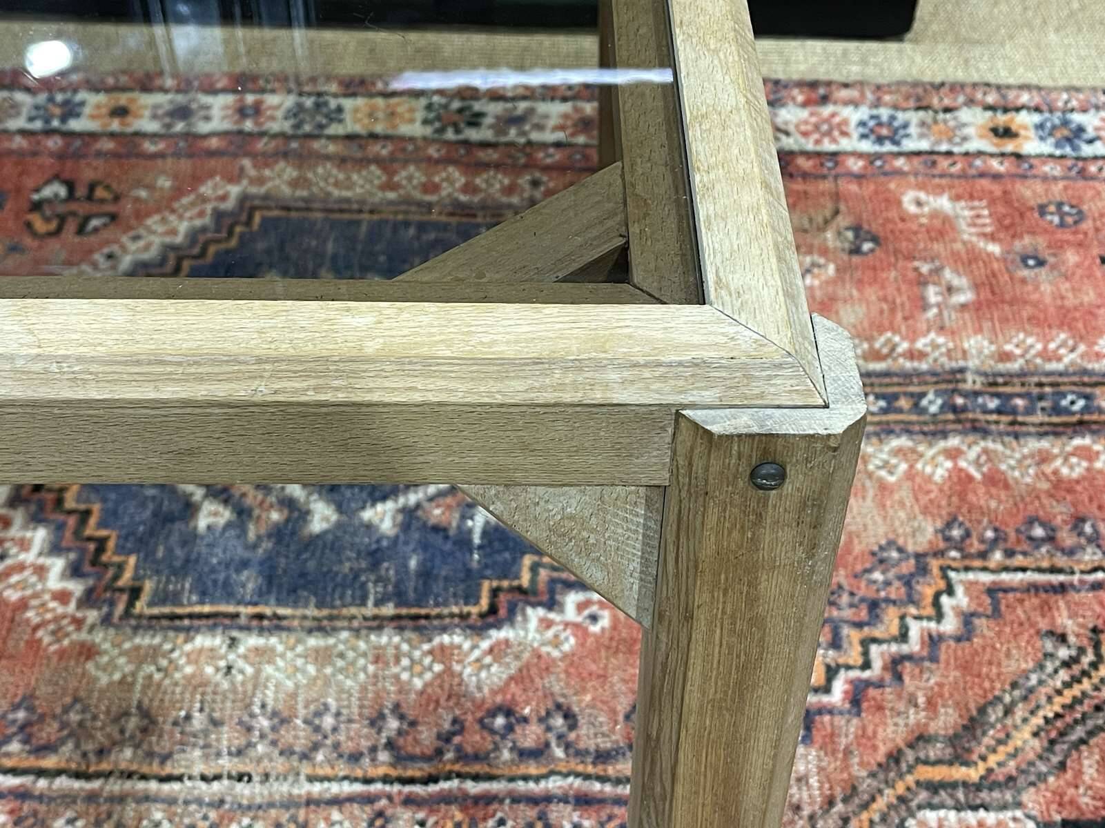 Coffee table in oak with a glass top, dating from the 1950s