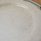 Large old round plate in iron earth