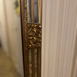 Mirror with a glazing bar