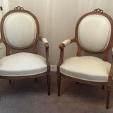 Pair of Louis XVI style medallion armchairs, late 19th / early 20th century.