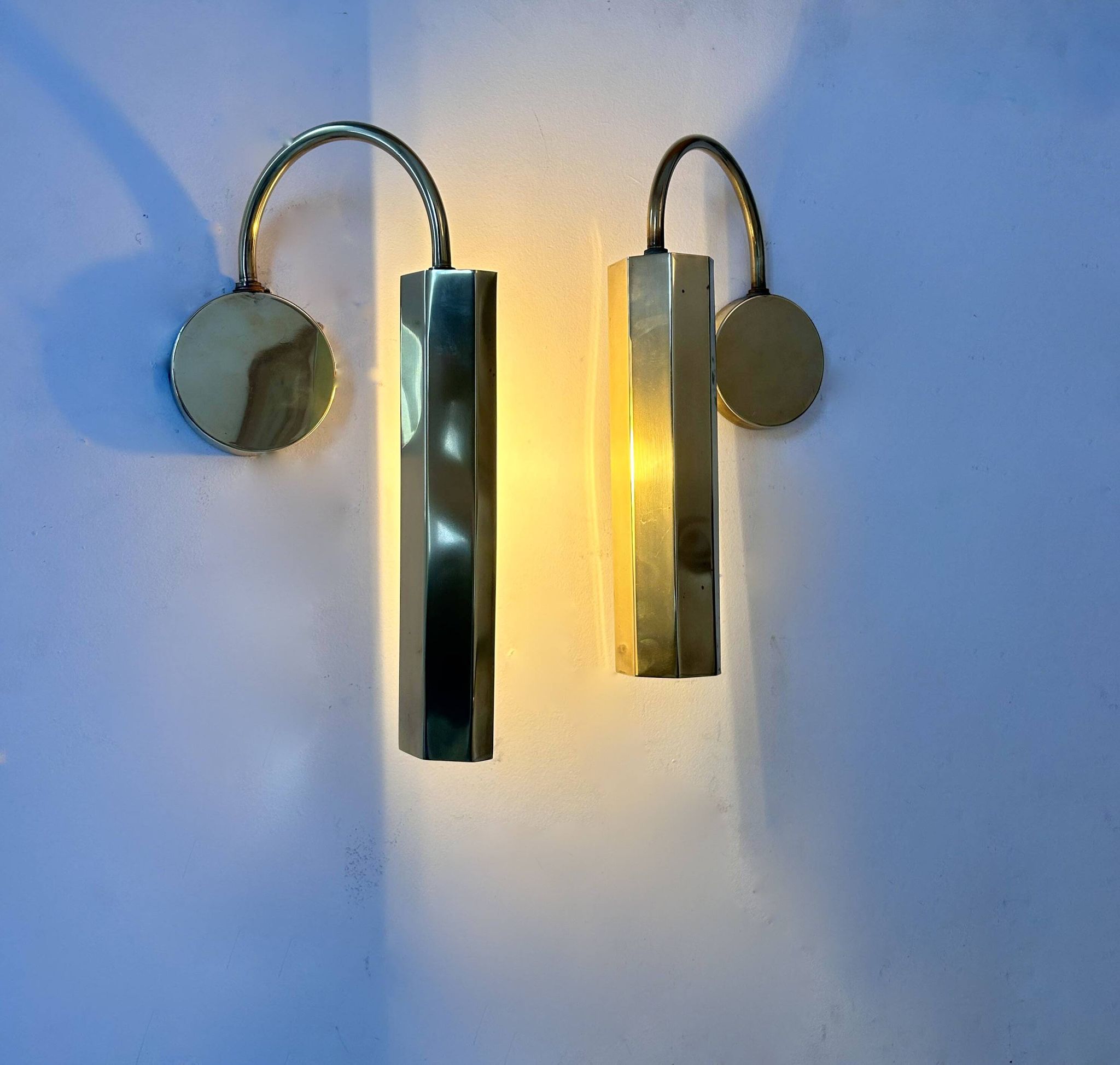 Pair of vintage adjustable wall lights, solid brass, France 1970