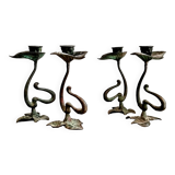 Set of four organically shaped bronze candlesticks in Art Nouveau style