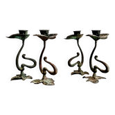 Set of four organically shaped bronze candlesticks in Art Nouveau style
