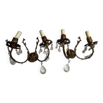 Pair of Louis XV style wall sconces in gilded bronze with glass pendants.