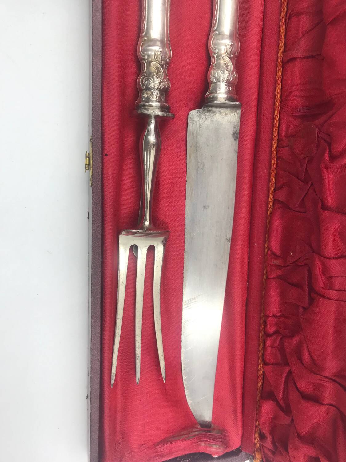 Antique silver-plated metal serving cutlery.