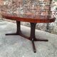 Large vintage Baumann table in rosewood with extensions, antique furniture.