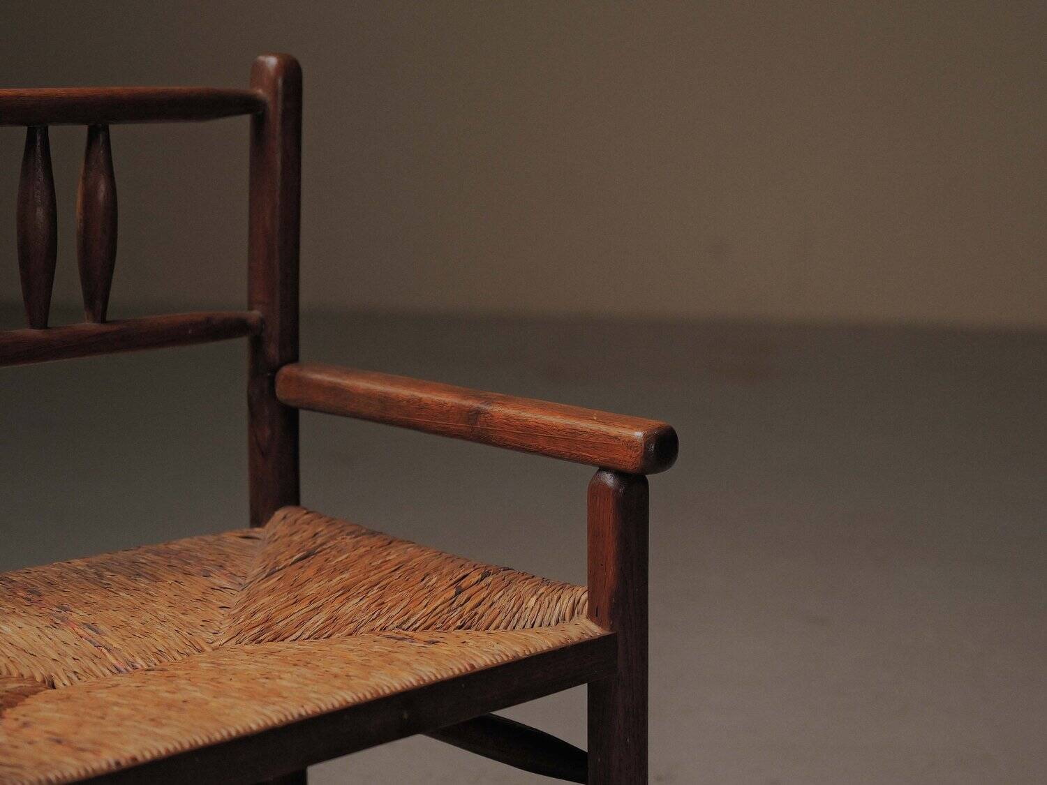 Wicker armchair in solid wood, handcrafted, France, around 1950.