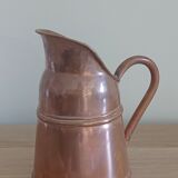 Antique copper pitcher