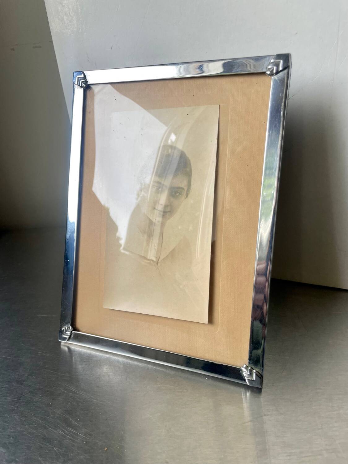 Art deco silver colored  metal frame  20.5  cm x 15.5 cm convex glass