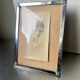 Art deco silver colored  metal frame  20.5  cm x 15.5 cm convex glass
