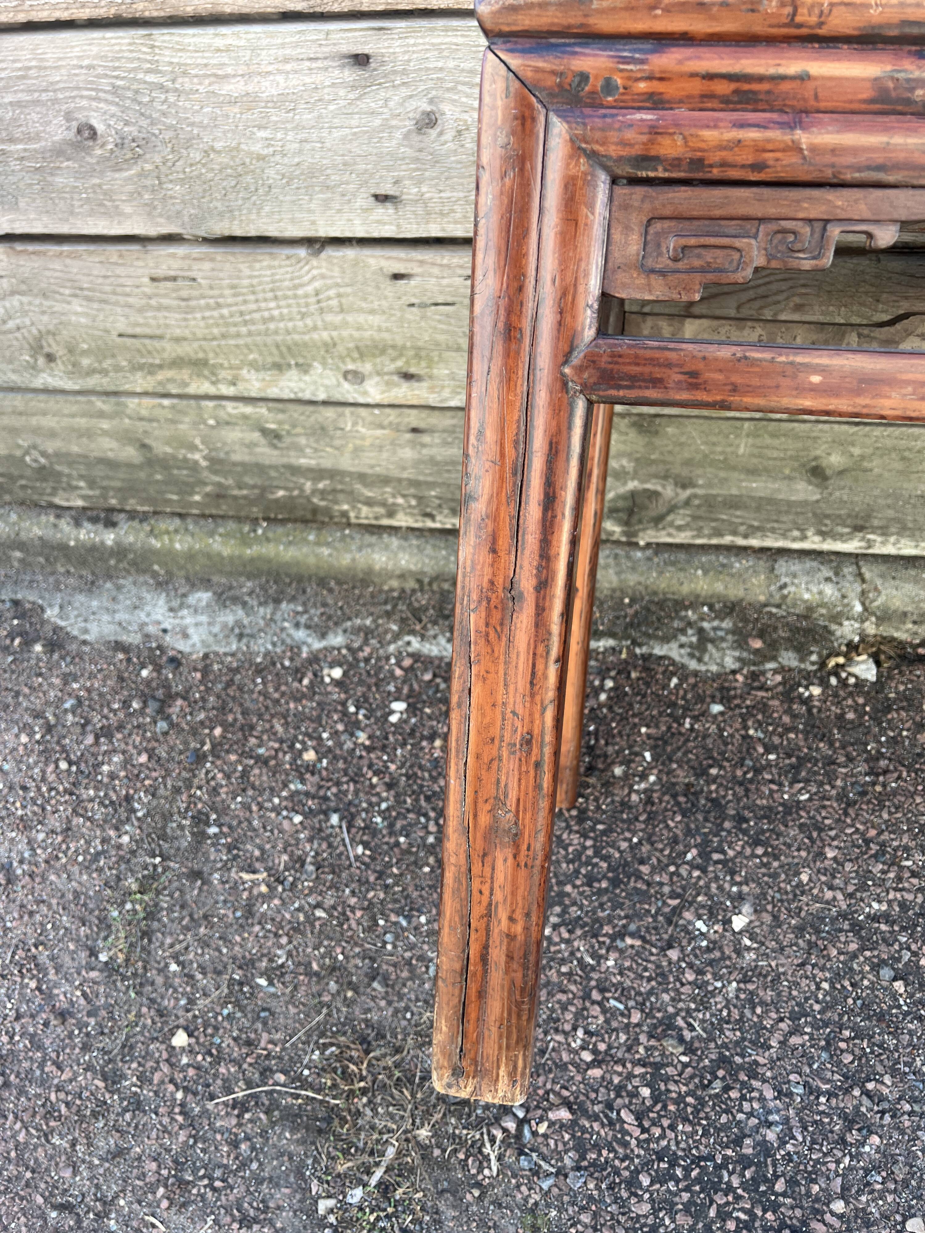 Asian low console in natural wood