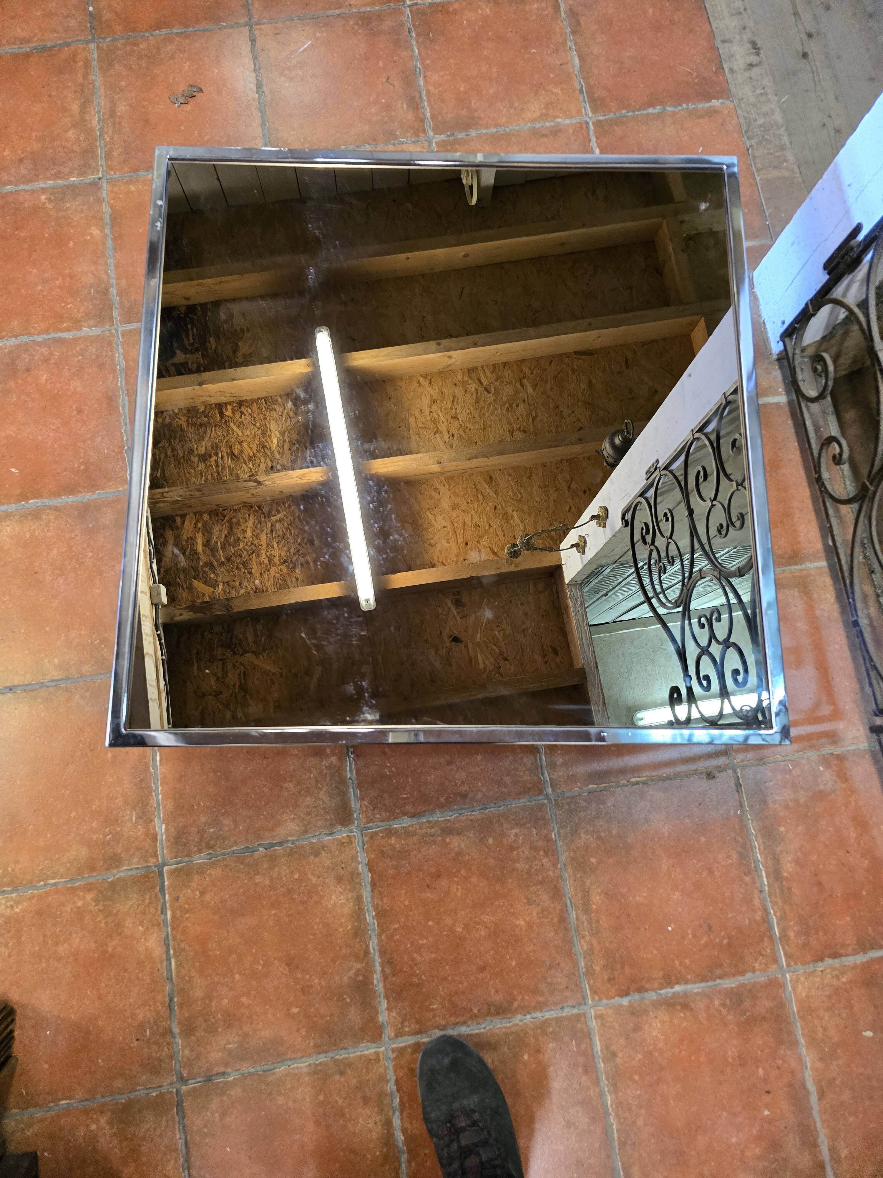 Chrome coffee table with smoked mirror top