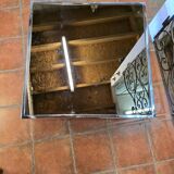 Chrome coffee table with smoked mirror top