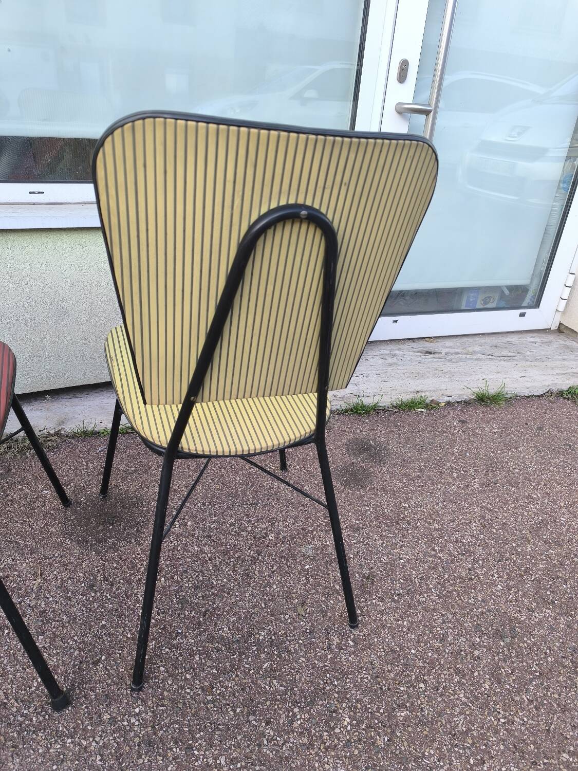 Set of 3 vintage yellow and red faux leather chairs.