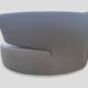 Circular rotating leather canapé with 6 cushions.