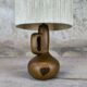Vintage wooden table lamp with a wool shade.