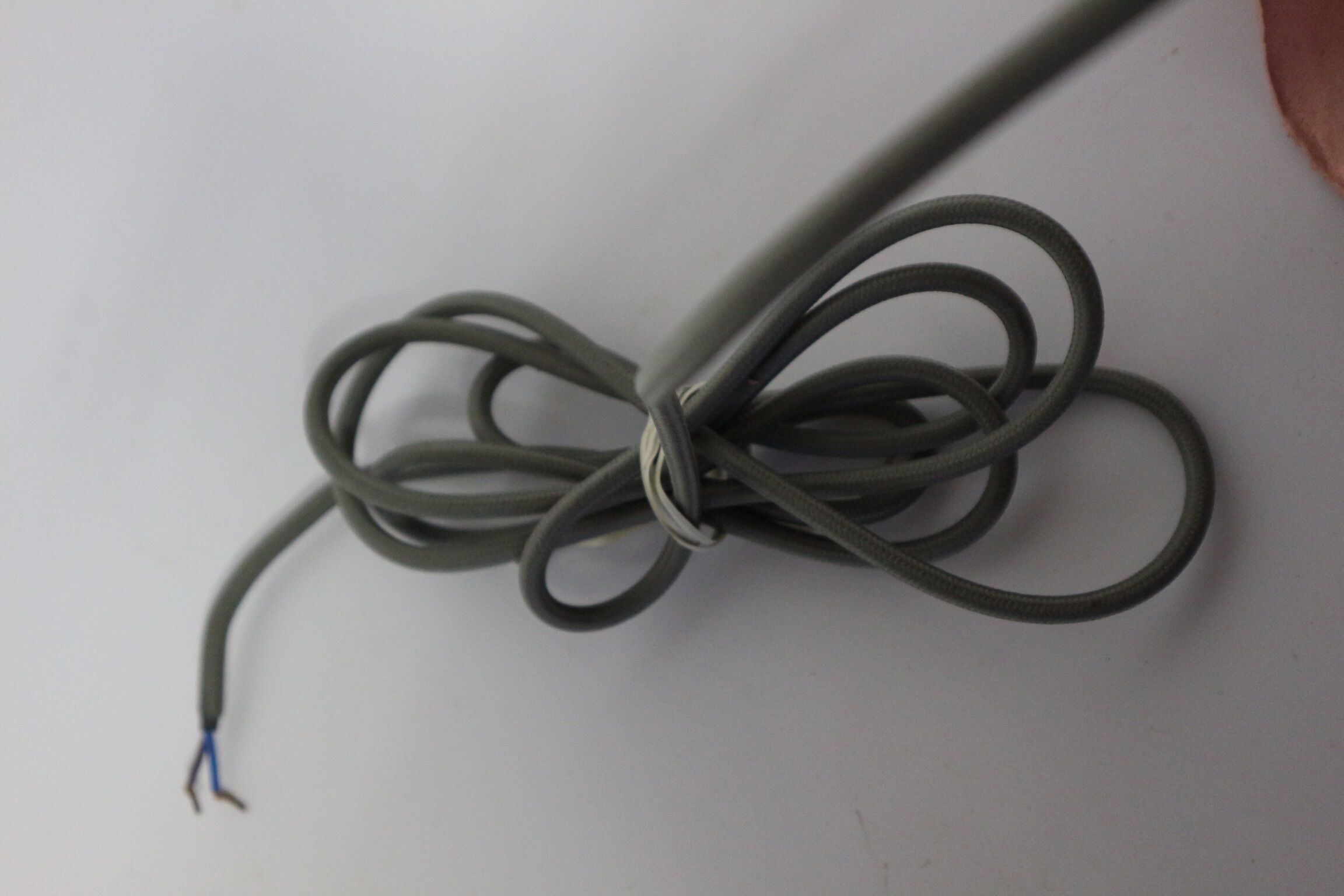 Two lamps/ pendant lamps in recycled cardboard, pink and green, seletti