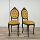 Pair of early 1900s wooden chairs with padded seat and backrests