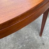 Round teak dining table