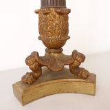 Empire period torch candle holder in bronze tripod base with lion's claws