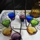 Old Italian alcohol decanter and its colorful glasses