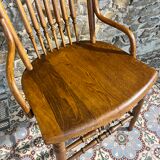 Wooden armchair with high back