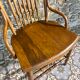 Wooden armchair with high back