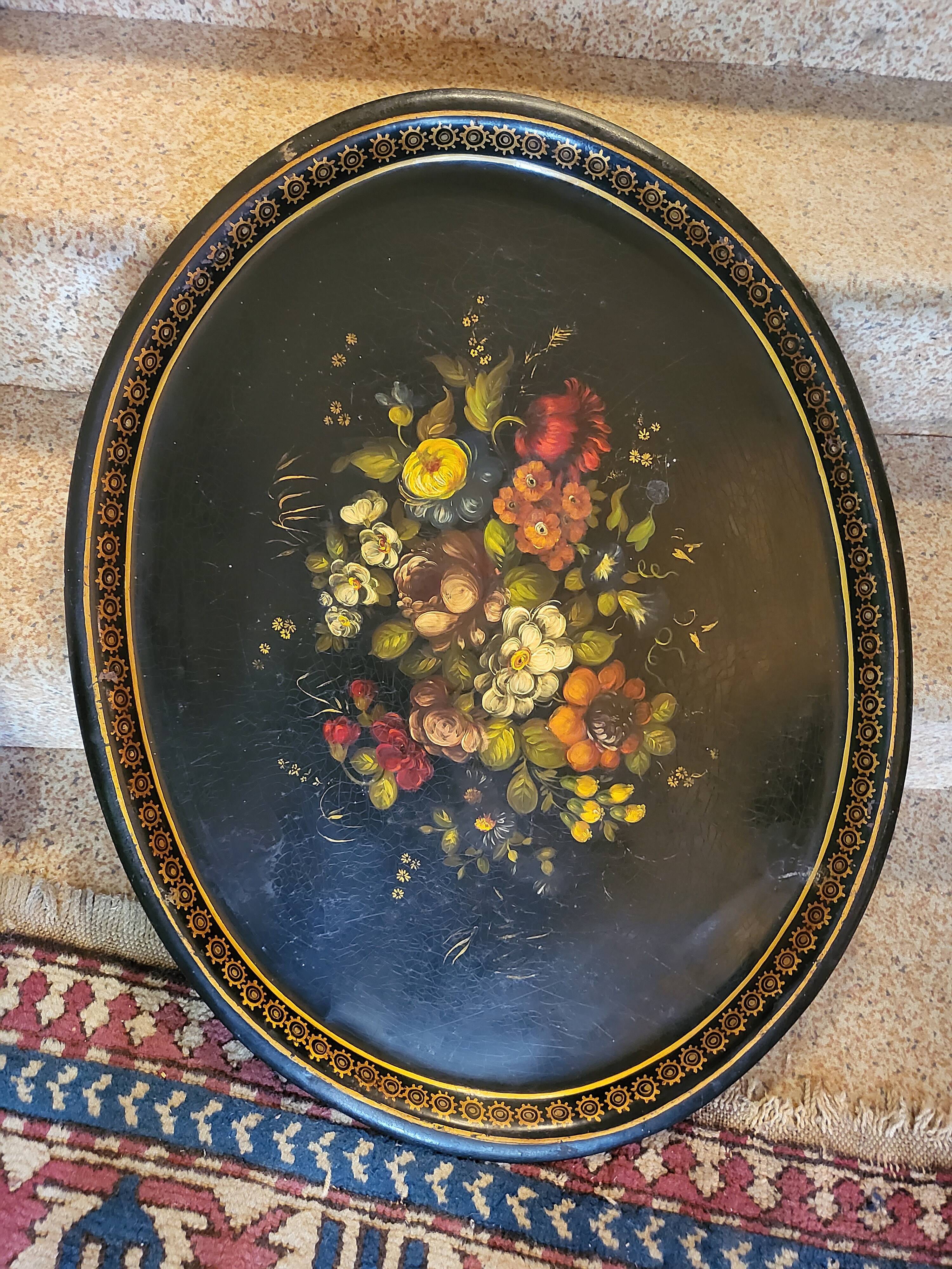 Old large tray with floral decoration