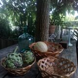 Set of three old rattan baskets