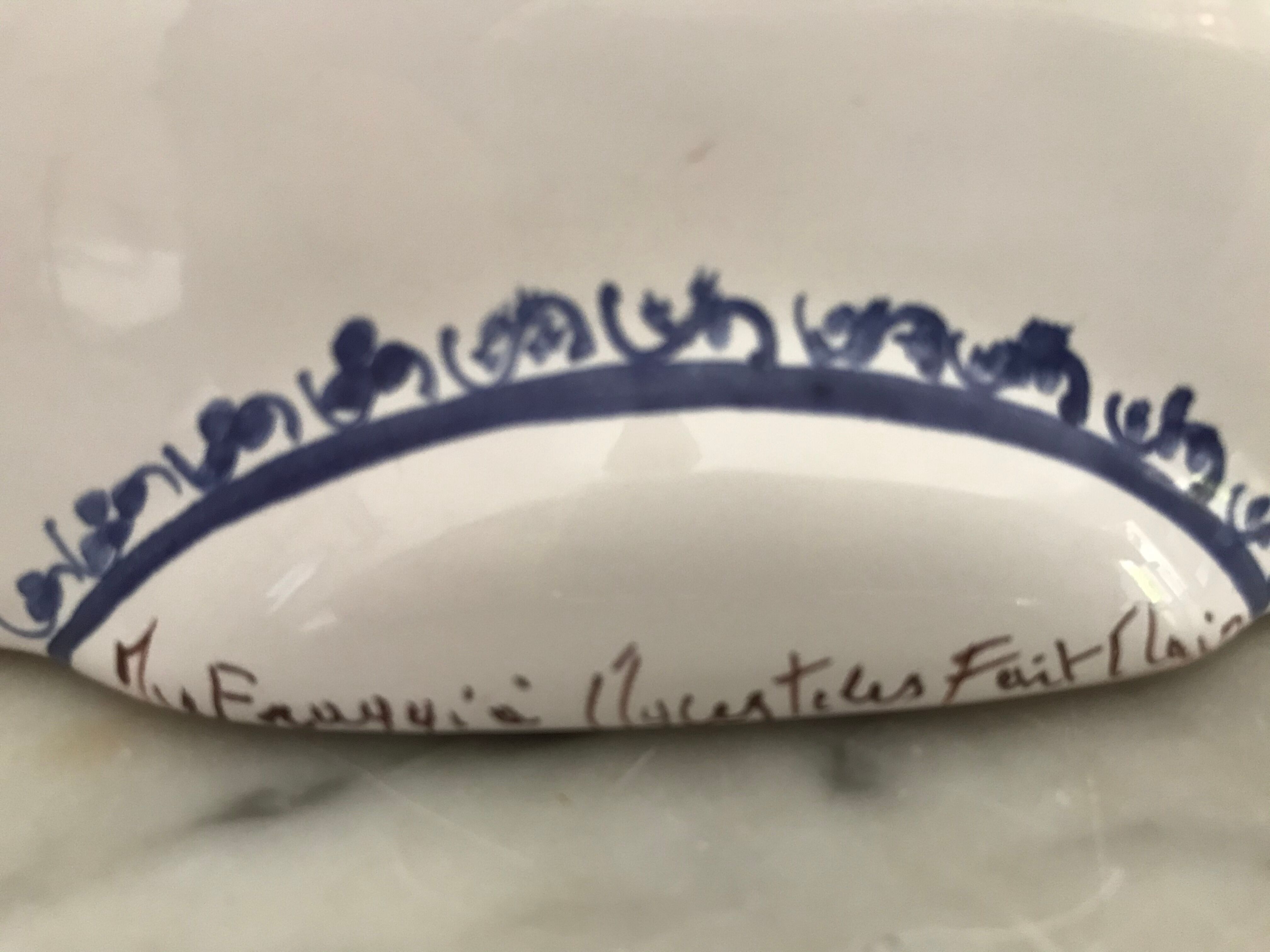 Pair of ceramic moustiers sconces