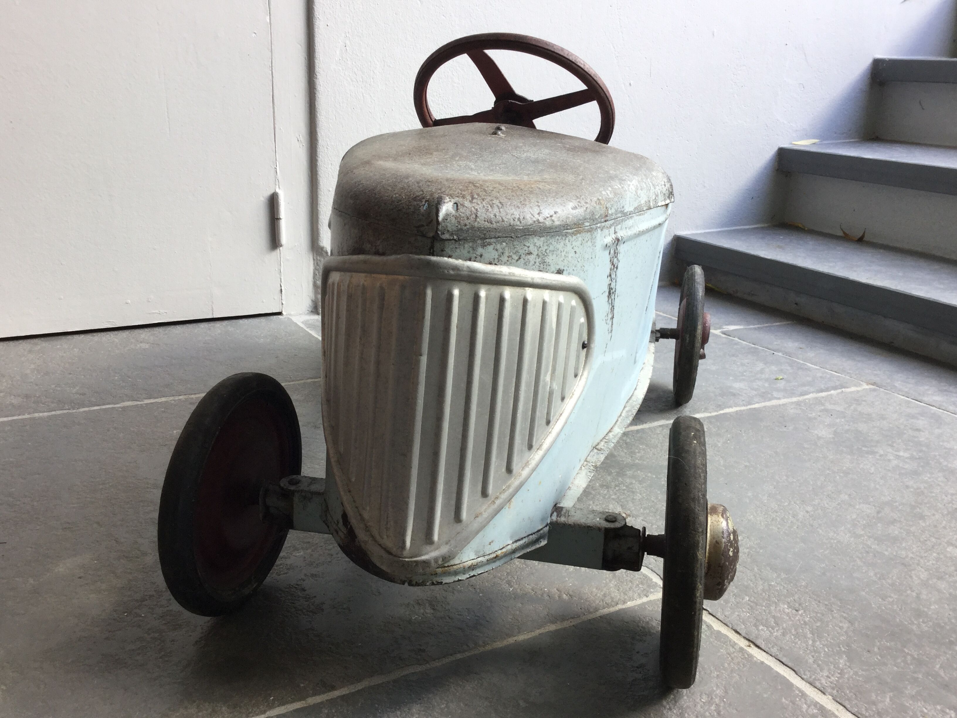Old metal pedal car 1930