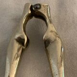 Pair of nutcrackers or anthropomorphic hazelnuts in bronze