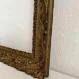 Old frame in gilded wood with stucco decoration circa 1900