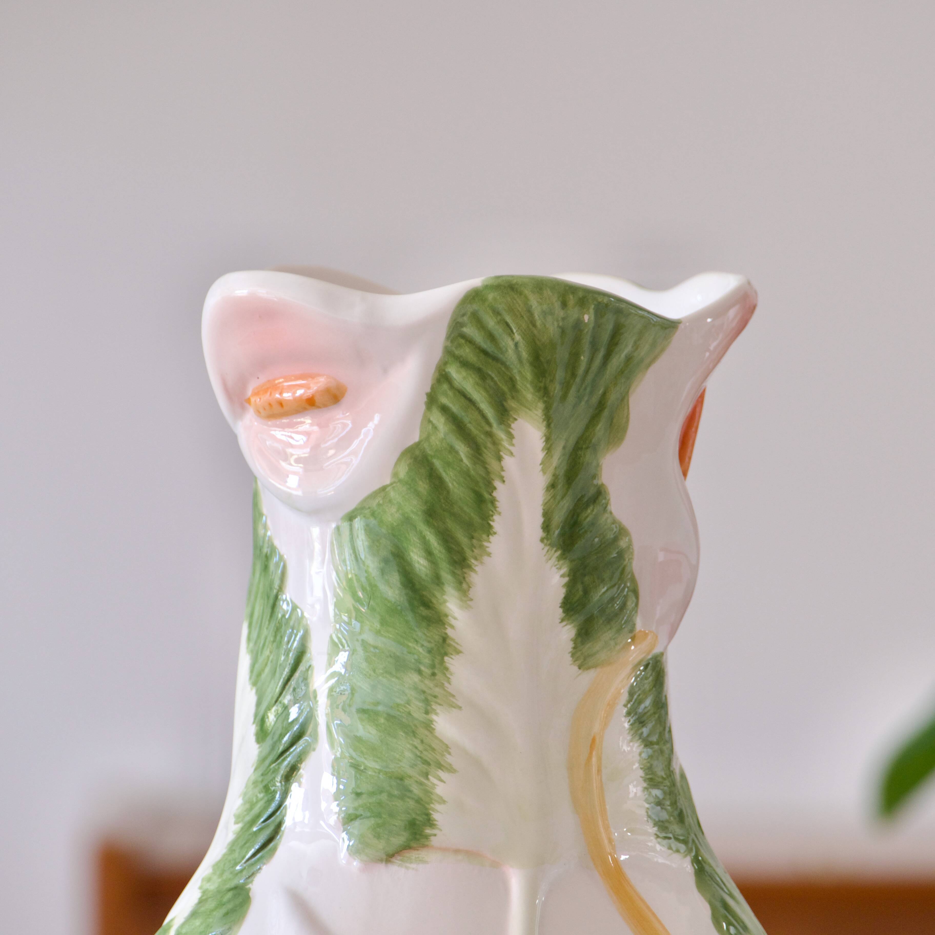 Large slip vase of Arum flowers