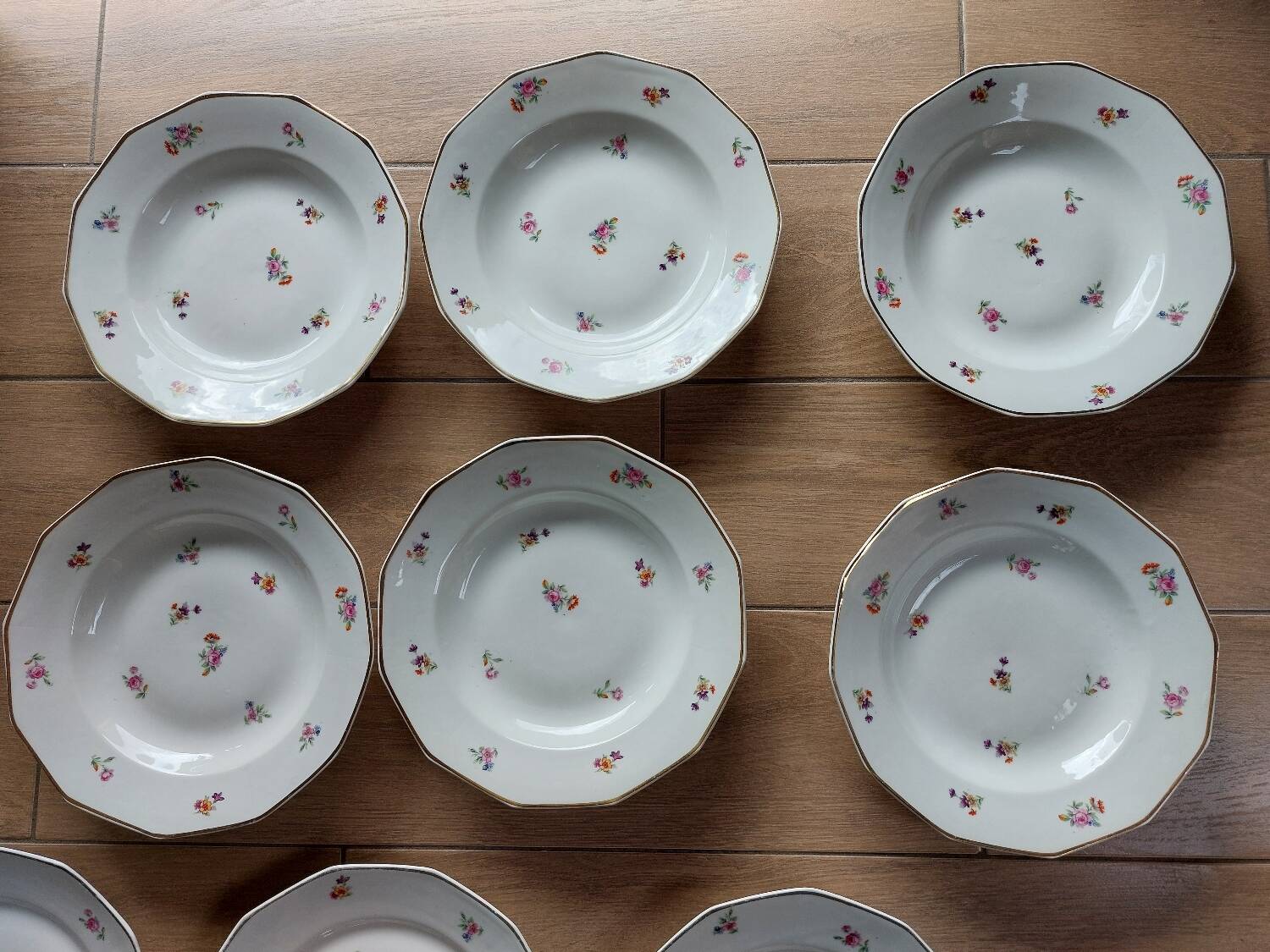 Set of 12 floral porcelain plates