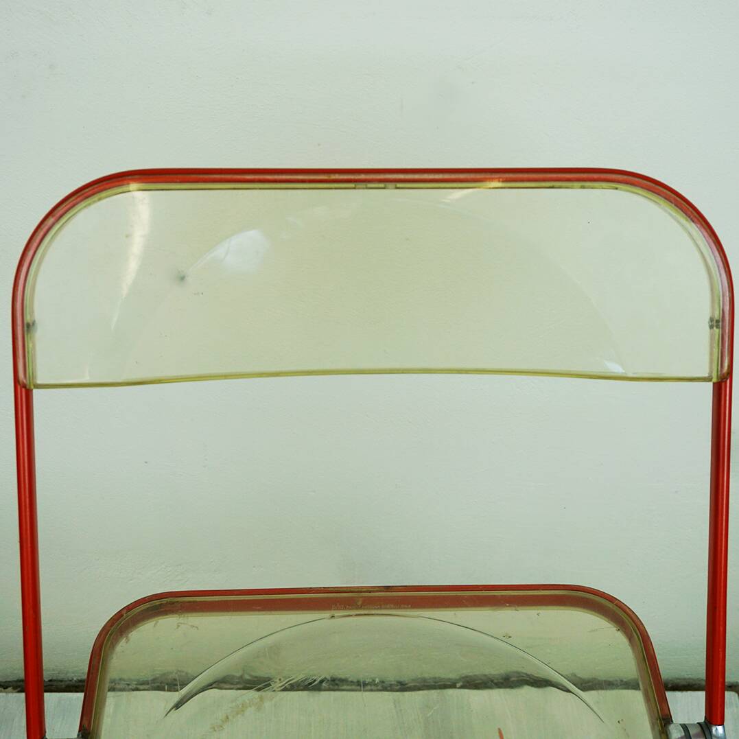 Red Plia Lucite folding chair by G. Piretti for Castelli Italy