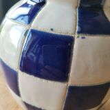 Blue and white checkerboard water pitcher