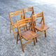 A set of 4 vintage folding wooden chairs, 1970s.