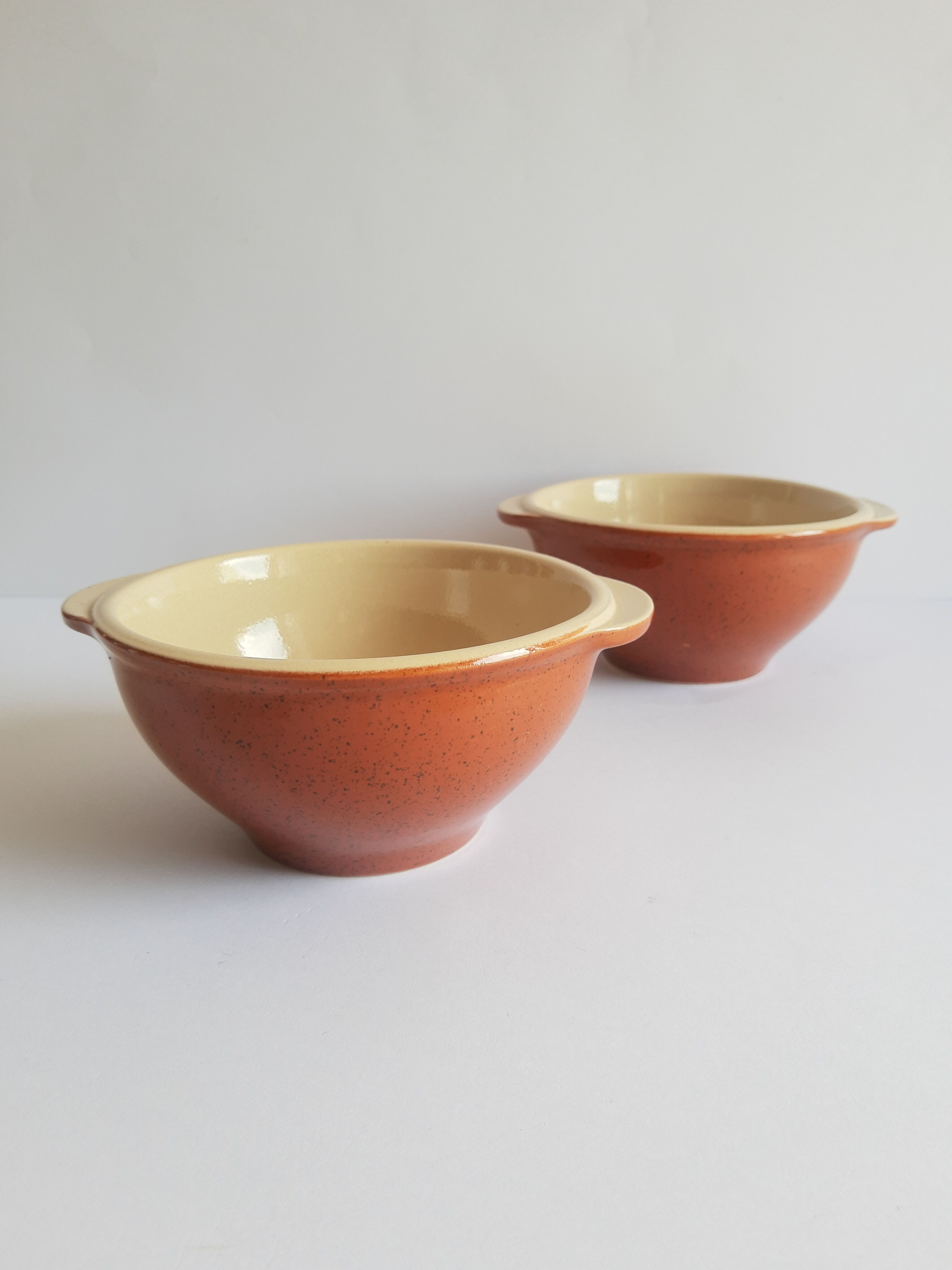 Duo of vintage Emile Henry cognac ear bowls